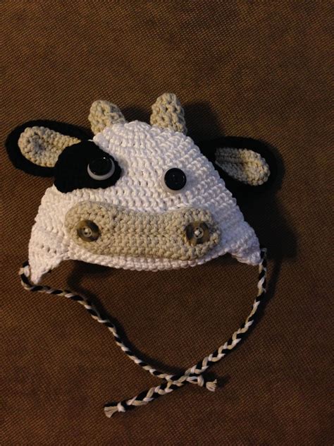 Adorable Crocheted Cow Hat Cow Hat Crochet Projects Crochet Hats