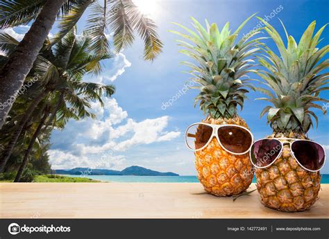 Pineapple With Sunglasses On Woodconcept Summer Background Stock