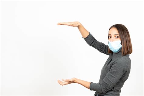 Hispanic Girl With A Face Mask During Pandemic Stock Photo Download