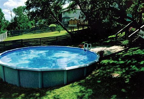 Lomart montessa is another above ground pool you can trust to fit your small backyard. Above ground pool in sloped backyard | Sloped backyard ...