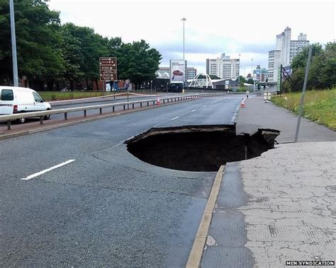 Mancunian Way Collapse Huge Hole Opens In Road After Rain Bbc News