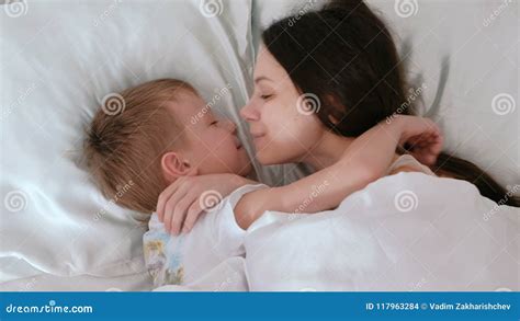 Mom And Son Wake Up Mom Kisses And Hugs Her Son Stock Footage Video Of Beautiful Caucasian