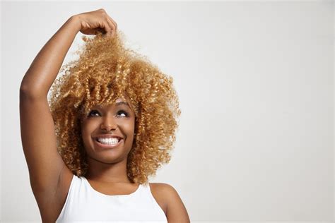 Black Woman Pull Her Hair Up Royalty Free Stock Image Storyblocks