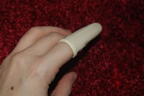 Using A Finger Cot Or Condom For Safe Sex