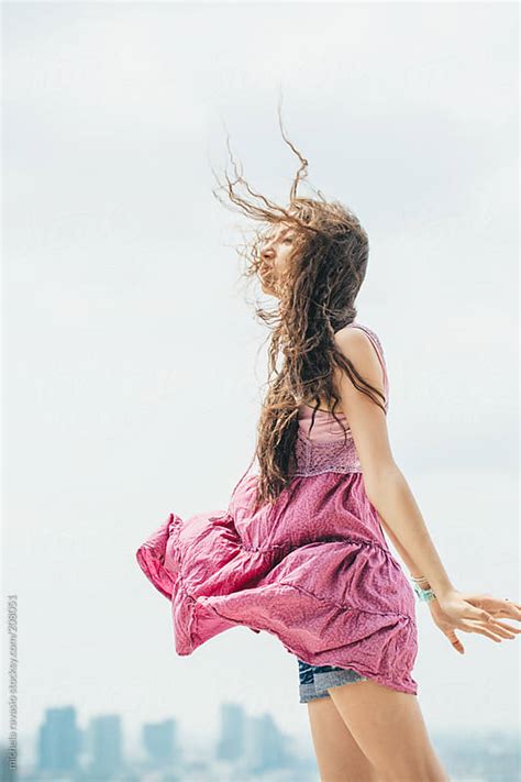 Pretty Girl Walking On The Roof By Michela Ravasio Stocksy United