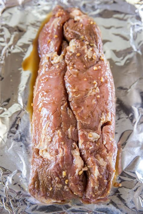 Remove foil, spoon some more sauce over the loin and cook for about another 30 minutes or until the loin interior temperature reaches about 145°f. Pork Tenderloin In The Oven In Foil - Oven Roasted Pork ...