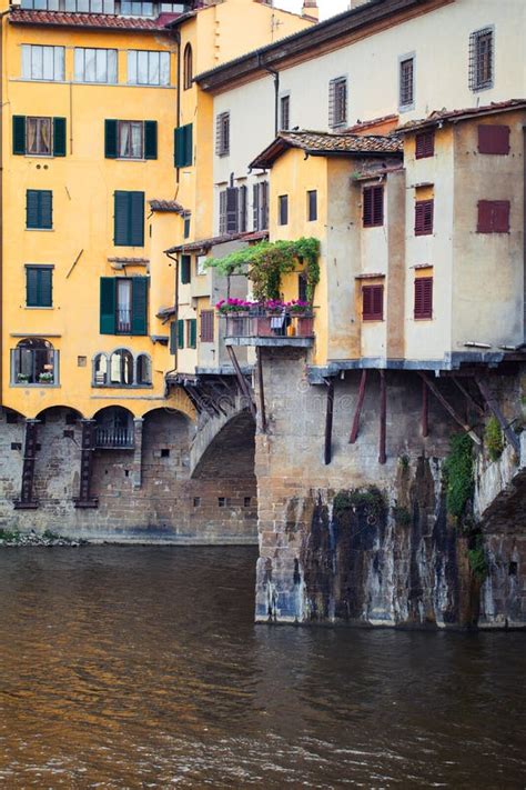 Stone Bridge Ponte Vecchio And The Arno River In Florence Tuscany