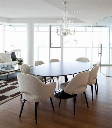 This saarinen tulip table and six avocado platner chairs are staples of the. Dining Room: Contemporary Dining Room With Black Oval ...
