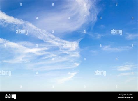 Scenic Skyscape With Fluffy Cirrus And Stratus Clouds In The