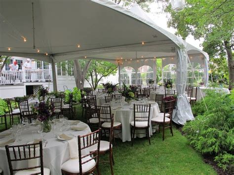 When you decide to have a backyard wedding at a family member's or friend's home, you automatically slash your wedding budget dramatically because you aren't paying for a venue. small black and gold afternoon tent wedding reception ...