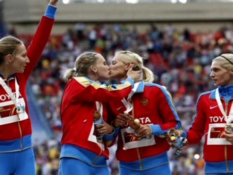 russian female athletes kiss on podium send message to government the hollywood gossip