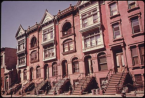 Turn Of The Century Brownstone Apartments Being Painted And Renovated