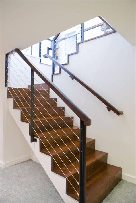 A banister provides additional safety on your staircase and visual appeal to a home. Stair Railings and Half-Walls Ideas| Basement Masters