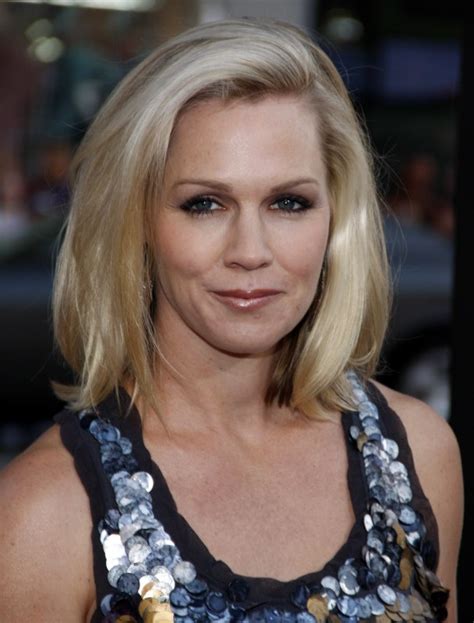 Jennie Garth Wearing Her Hair With The Top Styled Over To One Side
