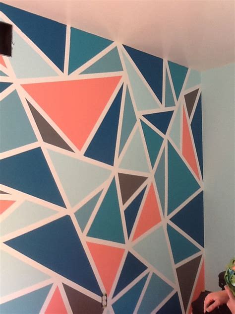 Using painters tape (i personally have the best luck with scotchblue painters tape but used whatever i had at home for this project) begin placing your geometric design on your accent wall. Tape crazy wall | Painted bedroom doors, Wall painting ...
