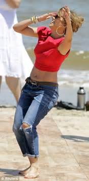 Jennifer Lopez Exposes Taut Midriff As She Cartwheels Through Brazilian