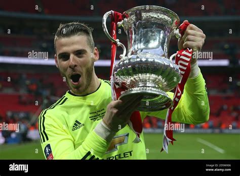 Manchester United Goalkeeper David De Gea Celebrates With The Fa Cup