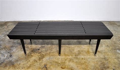 Octagonal coffee table with slate stone top. SELECT MODERN: Black Expandable Slat Bench or Coffee Table