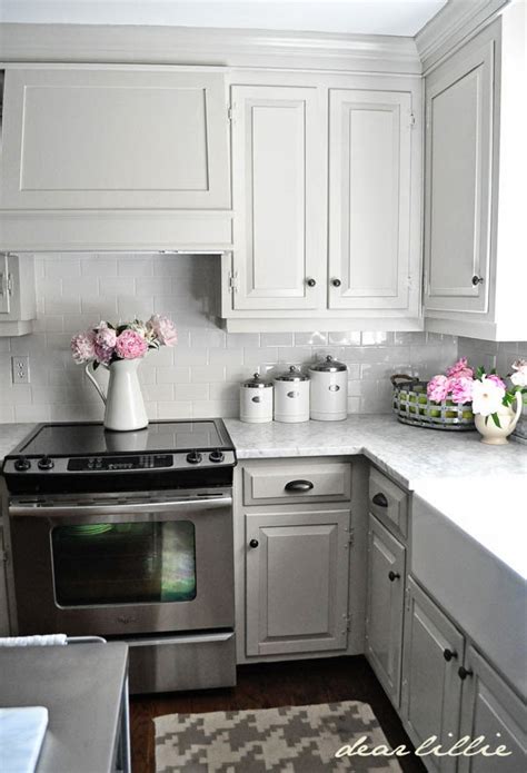 We purchased all of our cabinetry and some appliances (dishwasher, hood range) during one of ikea's kitchen events, which i totally recommend. 12 Gorgeous and Bright Light Gray Kitchens | Table and Hearth