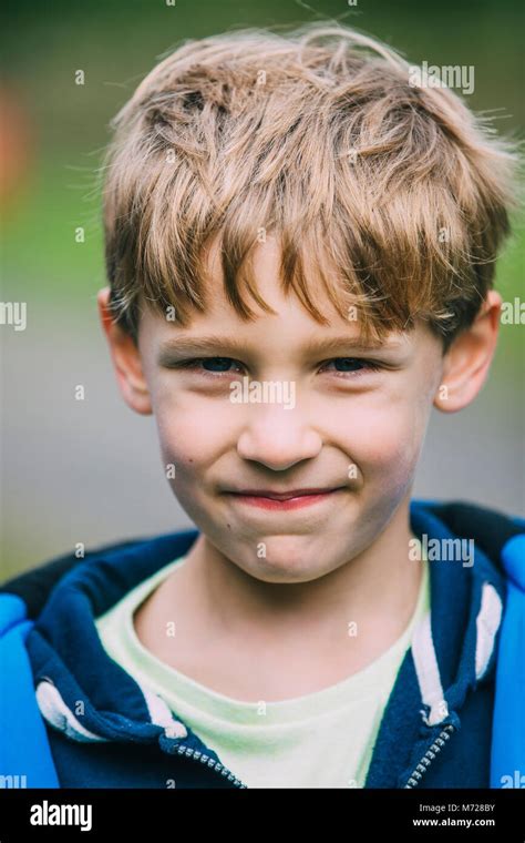 Portrait Of A Cute Little Boy While Out Hiking Stock Photo Alamy