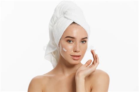 Close Up Beauty Portrait Of A Smiling Beautiful Half Naked Woman With Towel On Her Hair Applying