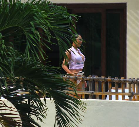 kim kardashian in bikini lounging by the pool at casa aramara 04 26 2017 celebmafia