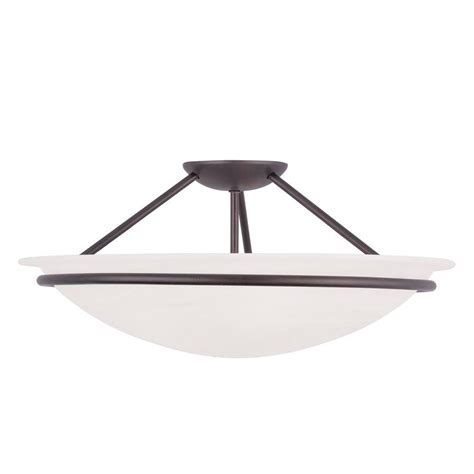 Handcrafted in iron with a deep bronze finish, this intricate edwardian design gives any room an instant focal point. Livex Lighting Providence 3-Light Ceiling Bronze ...