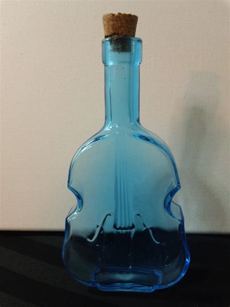 Vintage 6 Light Blue Glass Definitive Violin Bottle