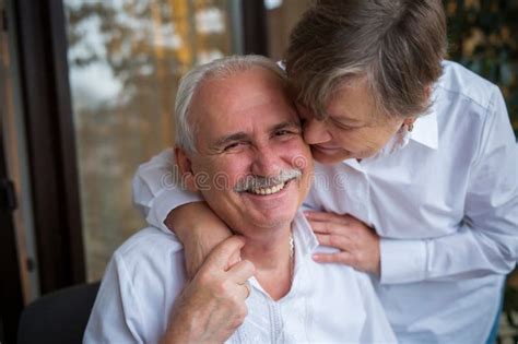 Elderly Man Kisses Hands Of The Elderly Woman Black And White Stock