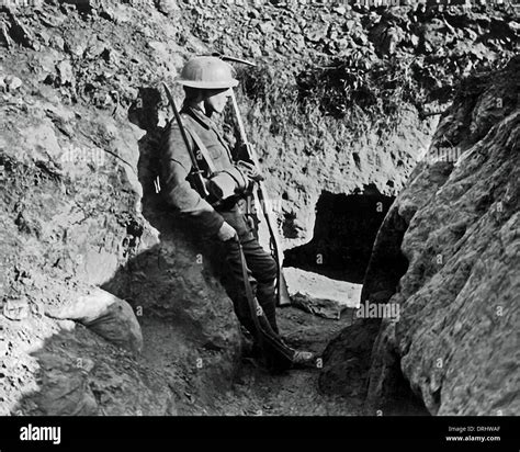 British Soldier Standing Sentry In A Trench Ww1 Stock Photo Alamy