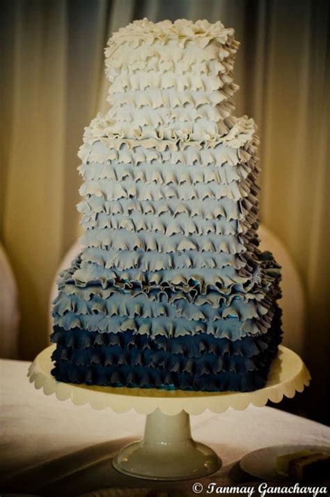 This ombre ruffles & silver wedding cake has three tiers of delicious cake and filling in a flavour of your choice from our menu. Baked. Ruffle cake in ombre | Ruffle cake, Special event ...