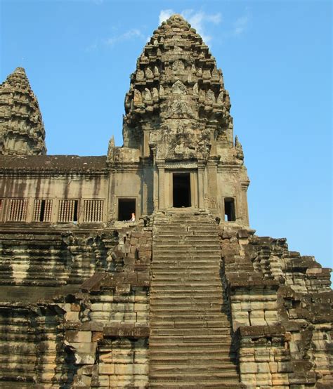 The world famous angkor wat cambodia belongs on every bucket list. Travel Curious Often - Angkor Wat & the Temple Cities