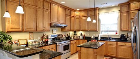 Kitchen cabinets take lots of punishment from cooking heat and how to replace kitchen cabinets. Kitchen Cabinet Refinishing Services in DFW | Aaron's Touch Up