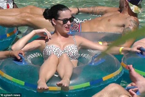 Katy Perry Surrounded By Men As She Floats Around Pool In