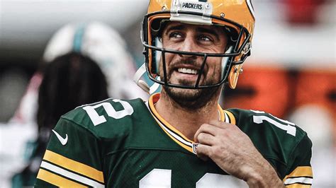 Aaron rodgers nfl quarterback green bay packers. Aaron Rodgers Signs Richest NFL Deal Ever