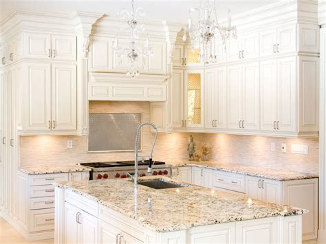 New caledonia granite white cabinets google search gray and. White Kitchen Cabinets with Granite Countertops Benefits ...