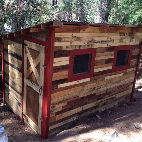 The only things purchased were the vinyl siding and the roofing, and the nails and hinges. our wing it Pallet Coop | Walk in chicken coop, Chicken coop pallets, Pallet coop