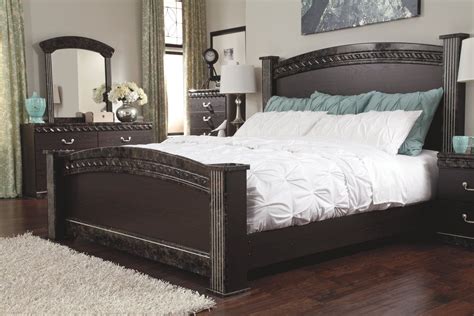 The furniture pieces are made from a variety of woods and in different shapes and sizes to. Vachel Queen Poster Bed | Ashley Furniture HomeStore ...