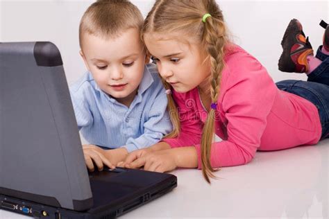 Kids Playing Computer Games Stock Image Image Of Kids People 4259455