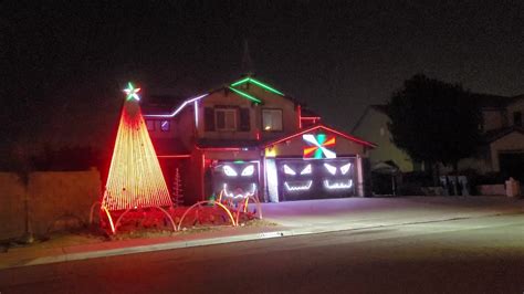 Riverside Christmas Holiday House Dancing Lights Display Synchronized