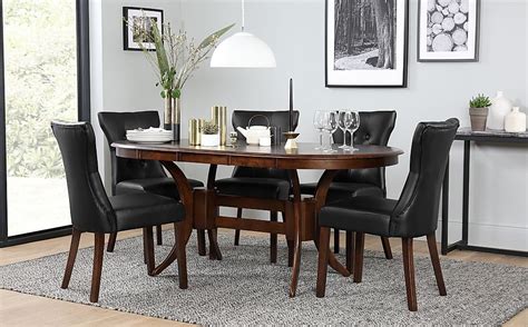 Combination of wood and rattan from banana tree plant to to add an exotic flair to your decor. Townhouse Oval Dark Wood Extending Dining Table with 6 ...