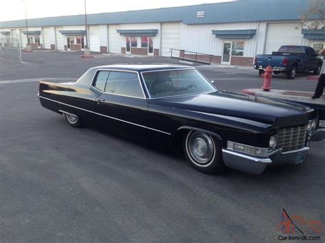 The legendary and iconic snoop dogg is finally parting with one of his most classic vehicles da snoop deville. 1969 Cadillac coupe deville 47k Orig miles BAGGED lowrider ...