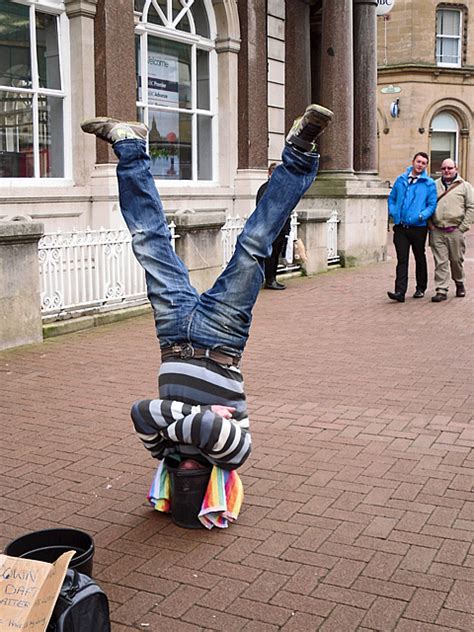 Man Standing On His Head In A Bucket © Rose And Trev Clough Cc By Sa