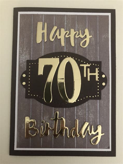 A 70th Birthday Card With The Number Seventy On It And Gold Foiled