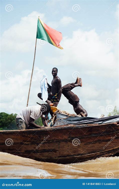 African Black Men Fishing On The Niger River Editorial Stock Photo