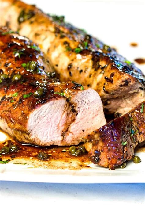 Brush your pork tenderloin with two tablespoons of olive or vegetable oil and sprinkle the mixture all over the place the bacon pieces diagonally over the top of the tenderloin, pressing bacon over the sides. Balsamic Roast Pork Tenderloin - Kevin Is Cooking