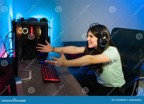 Woman Gamer Feeling Upset After An Error In A Video Game Stock Photo