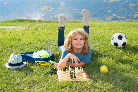 Chess Game For Kids Child Playing Chess Outdoor In Park Stock Image