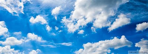 Blue Sky And Puffy Clouds Facebook Cover Photo