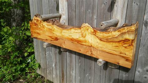 This type of mantel is much simpler in appearance than a traditional fireplace surround. A Spalted Black Ash Burled mantel. Live edge burl. Rustic ...